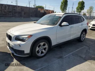 2015 BMW X1 sDrive28i with VIN WBAVM1C52FVZ94327, listed as a Copart auction lot 52998975 with 110,515 mi miles and Salvage Title. Bid and sale history available at carsss.com. Image 1.