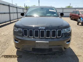 2021 Jeep Grand Cherokee Laredo E with VIN 1C4RJFAG8MC817661, listed as a Copart auction lot 52374235 with 25,305 mi miles and Salvage title. Bid and sale history available at DreamBid. Image 5.