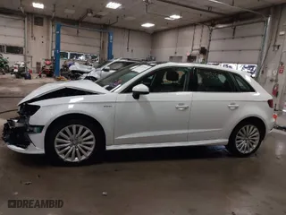 2016 Audi A3 e-tron Premium Plus with VIN WAUTPBFF2GA100666, listed as a IAAI auction lot 41315165 with 98,549 mi miles. Bid and sale history available at carsss.com. Image 15.