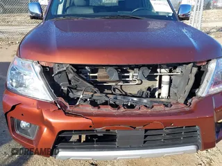 2018 Nissan Armada SL with VIN JN8AY2ND4J9059526, listed as a IAAI auction lot 41187756 with 116,572 mi miles and . Bid and sale history available at DreamBid. Image 6.