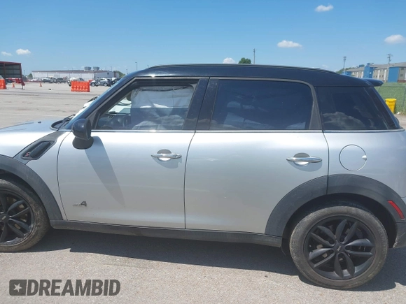 2011 MINI Countryman S with VIN WMWZC5C53BWL53641, listed as a IAAI auction lot 42547084 with 171,647 mi miles and . Bid and sale history available at DreamBid. Image 14.