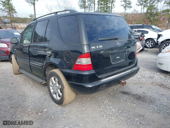 2000 Mercedes-Benz M-Class with VIN 4JGAB72E9YA208069, listed as a IAAI auction lot 41530528 with 155,967 mi miles. Bid and sale history available at carsss.com. Image 3.