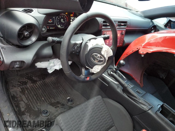 2023 Toyota 86 with VIN JF1ZNBB19P9765892, listed as a Copart auction lot 49554785 with 9,324 mi miles and Salvage title. Bid and sale history available at DreamBid. Image 8.
