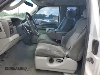 2003 Ford F-250 XL with VIN 1FTNX20L63EB37975, listed as a Copart auction lot 65723935 with 157,377 mi miles and Salvage title. Bid and sale history available at DreamBid. Image 7.
