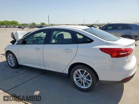 2018 Ford Focus SE z VIN 1FADP3F29JL225126, wystawiony jako Copart lot #52817265 z przebiegiem Nie podano mil oraz Szkoda całkowita • Salvage title. Historia ofert i sprzedaży dostępna na DreamBid. Obrazek 2.