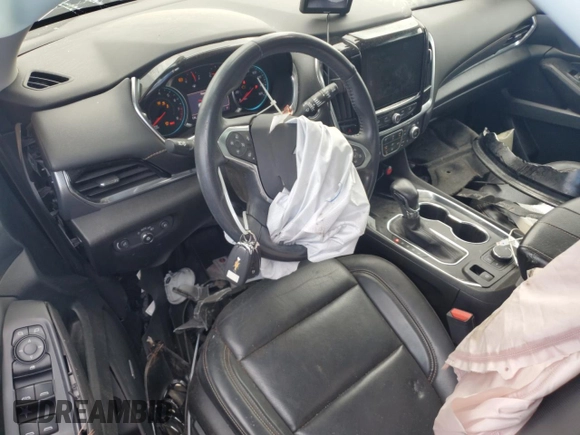 2021 Chevrolet Traverse Premier with VIN 1GNERKKW2MJ262862, listed as a Copart auction lot 58779765 with 76,927 mi miles and Salvage title. Bid and sale history available at DreamBid. Image 8.