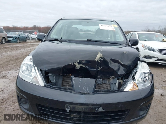 2011 Nissan Versa 1.8 S with VIN 3N1BC1AP7BL378133, listed as a IAAI auction lot 41917425 with 124,228 mi miles. Bid and sale history available at carsss.com. Image 12.