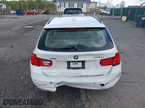 2014 BMW 3 Series 328i xDrive with VIN WBA3G7C55EKN37528, listed as a IAAI auction lot 42031076 with 55,627 mi miles and . Bid and sale history available at carsss.com. Image 16.