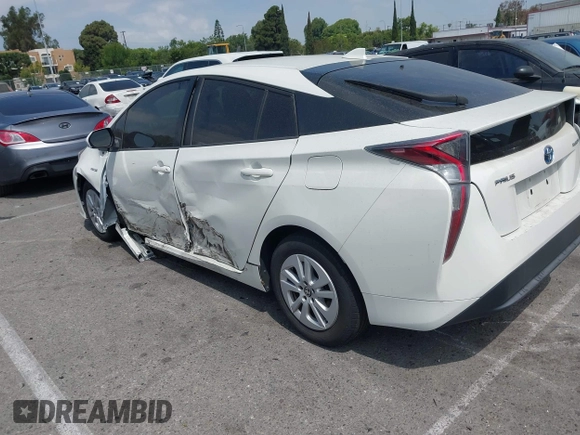 2016 Toyota Prius Two z VIN JTDKBRFU3G3024092, wystawiony jako IAAI lot #42338381 z przebiegiem 87 216 mil mil oraz . Historia ofert i sprzedaży dostępna na DreamBid. Obrazek 3.