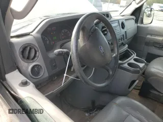 2010 Ford Econoline Passenger XL with VIN 1FMNE1BWXADA30935, listed as a Copart auction lot 77912734 with 153,775 mi miles and Salvage Title. Bid and sale history available at DreamBid. Image 8.