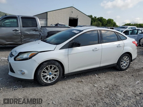 2012 Ford Focus SE z VIN 1FAHP3F2XCL310660, wystawiony jako Copart lot #60217625 z przebiegiem 208 807 mil mil oraz Szkoda całkowita • Salvage title. Historia ofert i sprzedaży dostępna na DreamBid. Obrazek 1.