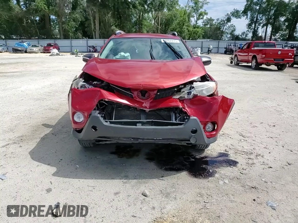 2014 Toyota RAV4 LE with VIN JTMZFREV5EJ021314, listed as a Copart auction lot 61082275 with 164,359 mi miles and Salvage title. Bid and sale history available at DreamBid. Image 14.
