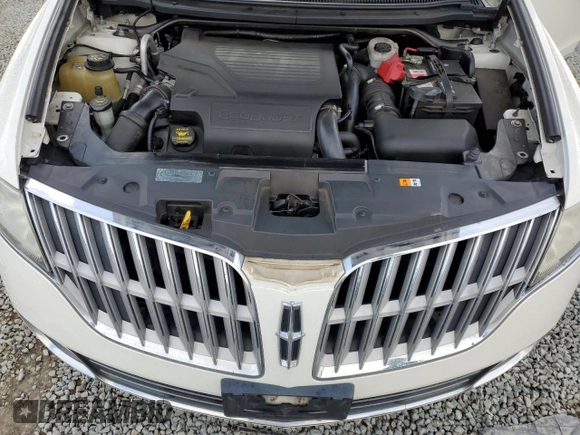 2012 Lincoln MKT EcoBoost with VIN 2LMHJ5AT9CBL52373, listed as a Copart auction lot 51474715 with 98,905 mi miles and Salvage Title. Bid and sale history available at DreamBid. Image 12.