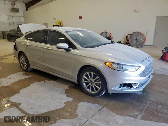 2017 Ford Fusion SE with VIN 3FA6P0HDXHR380057, listed as a Copart auction lot 59583425 with 115,038 mi miles and Salvage title. Bid and sale history available at DreamBid. Image 4.