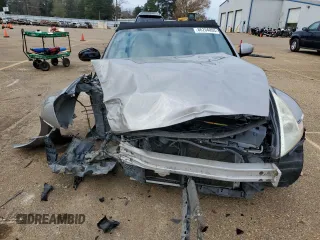 2010 Nissan 370Z z VIN JN1AZ4FH0AM301315, wystawiony jako Copart lot #86204894 z przebiegiem Nie podano mil oraz Szkody całkowita. Historia ofert i sprzedaży dostępna na DreamBid. Obrazek 5.