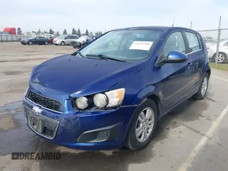 2013 Chevrolet Sonic LT with VIN 1G1JC6SB1D4171148, listed as a IAAI auction lot 41631280 with 147,874 mi miles. Bid and sale history available at carsss.com. Image 2.