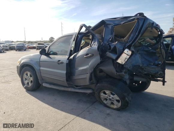 2006 Ford Escape XLT with VIN 1FMYU03156KA57685, listed as a Copart auction lot 77345044 with 0 mi miles and Salvage Title. Bid and sale history available at carsss.com. Image 2.
