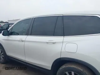 2019 Honda Pilot EX-L with VIN 5FNYF6H52KB025930, listed as a IAAI auction lot 42117673 with 84,721 mi miles and . Bid and sale history available at DreamBid. Image 14.