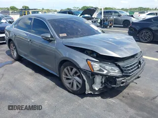 2018 Volkswagen Passat SE with VIN 1VWBA7A38JC020260, listed as a IAAI auction lot 42601688 with 111,826 mi miles and . Bid and sale history available at DreamBid. Image 1.