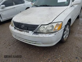 2001 Toyota Avalon XL z VIN 4T1BF28B31U182971, wystawiony jako IAAI lot #42276391 z przebiegiem 226 582 mil mil oraz . Historia ofert i sprzedaży dostępna na DreamBid. Obrazek 6.