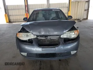 2009 Hyundai Elantra SE z VIN KMHDU46D49U605681, wystawiony jako Copart lot #55157225 z przebiegiem 220 774 mil mil oraz Szkoda całkowita • Salvage title. Historia ofert i sprzedaży dostępna na DreamBid. Obrazek 5.