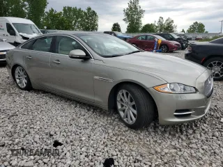 2014 Jaguar XJ z VIN SAJWJ1CD9E8V62338, wystawiony jako Copart lot #58924065 z przebiegiem 60 909 mil mil oraz Czysty tytuł • Clean title. Historia ofert i sprzedaży dostępna na DreamBid. Obrazek 4.