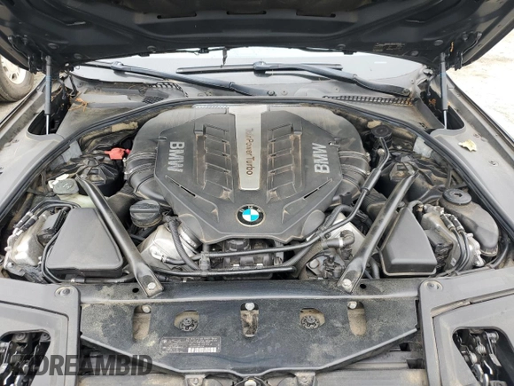 2014 BMW 5 Series 550i xDrive с VIN WBAKP9C55ED692057, выставлен на аукционе Copart как лот 59210515 с пробегом 94 355 миль миль и Списание • Salvage title. История ставок и продаж доступна на DreamBid. Изображение 11.