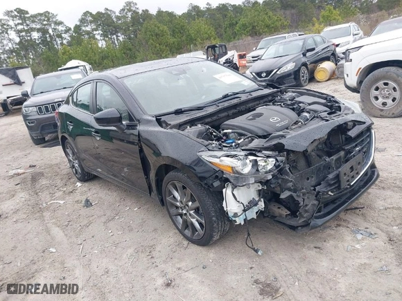2018 Mazda Mazda3 4-Door Touring with VIN 3MZBN1V38JM251069, listed as a IAAI auction lot 41757510 with 65,442 mi miles. Bid and sale history available at carsss.com. Image 1.