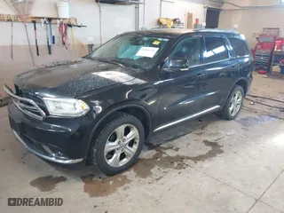 2014 Dodge Durango Limited with VIN 1C4RDJDG1EC973130, listed as a IAAI auction lot 41846596 with 166,182 mi miles. Bid and sale history available at carsss.com. Image 17.