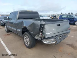 2002 GMC Sierra 1500 SLE with VIN 2GTEC19V121231109, listed as a IAAI auction lot 41906878 with 237,729 mi miles. Bid and sale history available at carsss.com. Image 6.