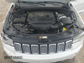 2018 Jeep Grand Cherokee Overland with VIN 1C4RJFCG5JC437508, listed as a Copart auction lot 51814795 with 104,598 mi miles and Salvage title. Bid and sale history available at DreamBid. Image 12.