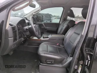 2010 Nissan Titan LE with VIN 1N6BA0EC8AN318538, listed as a Copart auction lot 74122194 with Not Provided miles and Salvage Title. Bid and sale history available at carsss.com. Image 7.