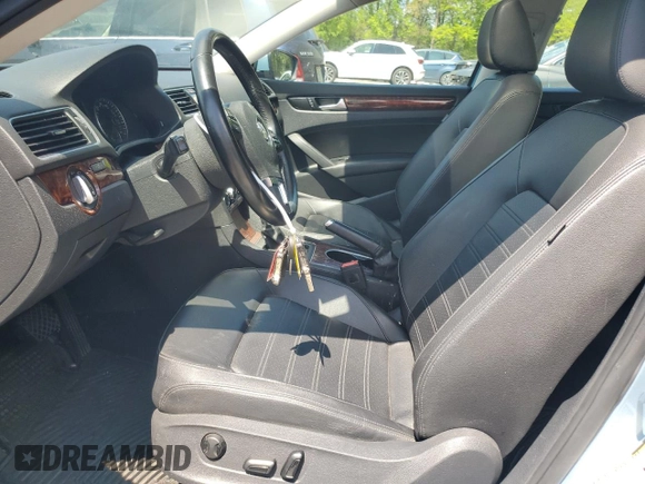 2013 Volkswagen Passat SEL Premium with VIN 1VWCH7A37DC066795, listed as a Copart auction lot 52380595 with 128,439 mi miles and Clean Title. Bid and sale history available at carsss.com. Image 7.