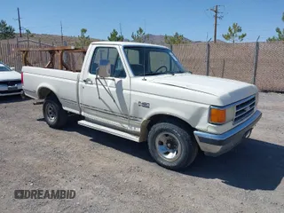 1990 Ford F-150 with VIN 2FTDF15N6LCA44303, listed as a IAAI auction lot 41981297 with 63,097 mi miles. Bid and sale history available at carsss.com. Image 1.