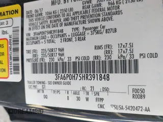 2017 Ford Fusion SE with VIN 3FA6P0H75HR391848, listed as a IAAI auction lot 40239061 with 173,515 mi miles. Bid and sale history available at carsss.com. Image 9.