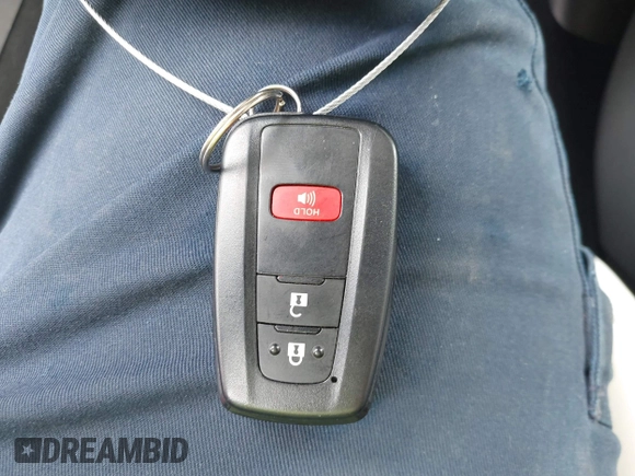 2021 Toyota Prius L Eco with VIN JTDKAMFU6M3137679, listed as a IAAI auction lot 42488129 with 52,414 mi miles and . Bid and sale history available at DreamBid. Image 11.