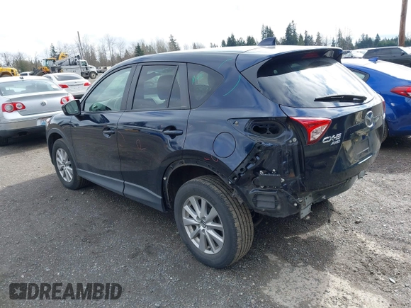 2015 Mazda CX-5 Touring with VIN JM3KE4CY5F0453646, listed as a IAAI auction lot 41740574 with 91,167 mi miles. Bid and sale history available at carsss.com. Image 3.