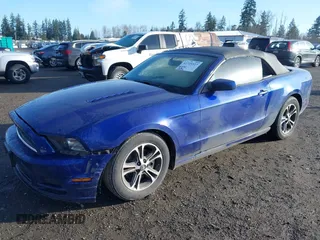 2014 Ford Mustang V6 with VIN 1ZVBP8EM2E5243069, listed as a IAAI auction lot 41725527 with 113,692 mi miles. Bid and sale history available at carsss.com. Image 2.