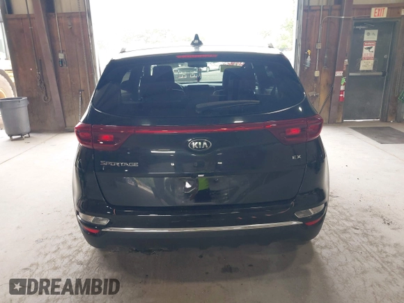 2021 Kia Sportage EX z VIN KNDPNCAC5M7886551, wystawiony jako IAAI lot #42645206 z przebiegiem 49 312 mil mil oraz . Historia ofert i sprzedaży dostępna na DreamBid. Obrazek 16.