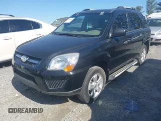 2010 Kia Sportage LX with VIN KNDKG3A47A7701814, listed as a IAAI auction lot 41991983 with 59,584 mi miles and . Bid and sale history available at carsss.com. Image 2.