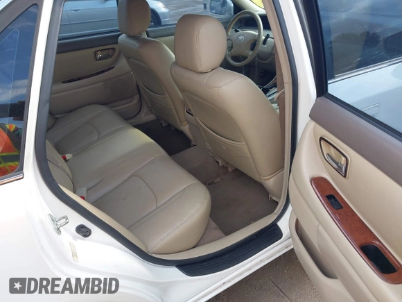 2002 Toyota Avalon XL with VIN 4T1BF28B72U217884, listed as a IAAI auction lot 42145482 with 195,960 mi miles and . Bid and sale history available at DreamBid. Image 8.