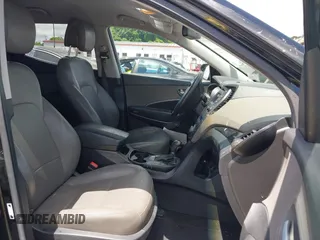 2013 Hyundai Santa Fe Sport z VIN 5XYZUDLA1DG050879, wystawiony jako IAAI lot #42236937 z przebiegiem 124 779 mil mil oraz . Historia ofert i sprzedaży dostępna na DreamBid. Obrazek 5.
