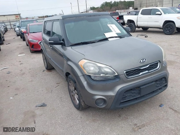 2012 Kia Soul + with VIN KNDJT2A66C7412428, listed as a IAAI auction lot 41636685 with 165,512 mi miles. Bid and sale history available at carsss.com. Image 1.