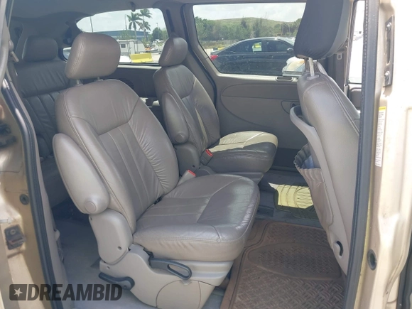 2001 Dodge Caravan ES with VIN 2B8GP54L51R198959, listed as a IAAI auction lot 41941050 with 208,396 mi miles and . Bid and sale history available at carsss.com. Image 8.