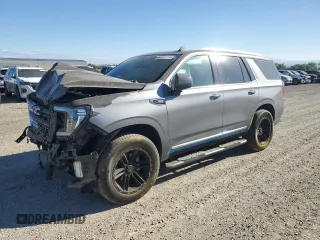 2022 GMC Yukon SLT with VIN 1GKS2BKD0NR115087, listed as a Copart auction lot 64805714 with 43,977 mi miles and Salvage Title. Bid and sale history available at carsss.com. Image 1.