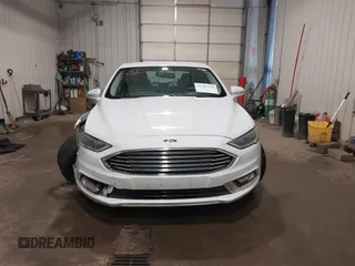 2017 Ford Fusion Titanium with VIN 3FA6P0K98HR124178, listed as a IAAI auction lot 42207938 with 89,352 mi miles and . Bid and sale history available at DreamBid. Image 12.