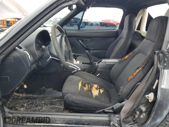 1994 Mazda MX-5 Miata with VIN JM1NA3534R0513305, listed as a Copart auction lot 52489865 with 150,481 mi miles and Salvage title. Bid and sale history available at DreamBid. Image 7.