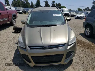 2013 Ford Escape SE with VIN 1FMCU0GX4DUB91663, listed as a Copart auction lot 59167195 with 115,081 mi miles and Salvage title. Bid and sale history available at DreamBid. Image 5.
