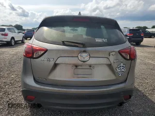 2014 Mazda CX-5 Sport with VIN JM3KE2BE7E0350965, listed as a Copart auction lot 60130195 with 196,072 mi miles and Clean title. Bid and sale history available at DreamBid. Image 6.