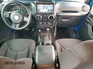2015 Jeep Wrangler Unlimited Sport with VIN 1C4BJWDG1FL726599, listed as a Copart auction lot 57483935 with 112,067 mi miles and Clean title. Bid and sale history available at DreamBid. Image 8.